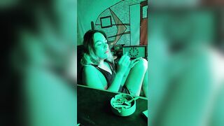 Bombshell stepsister smokes a cigarette