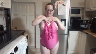 Fiance with long breasts dancing into swimsuit