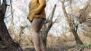 milf with huge booty covered into pants give a plentiful golden shower outside