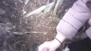 Hand Job into the field with much cum