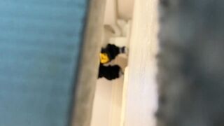 Spy Under Restroom Door