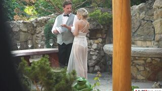 Petite bride is dped by hubby and waiter