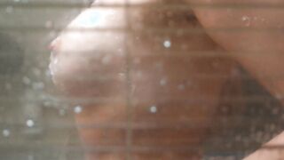 A long sex toy after a shower brings joy and satisfaction