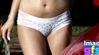 2 Beauty Dark Haired Nude Carwash showing long medium titties and great butt