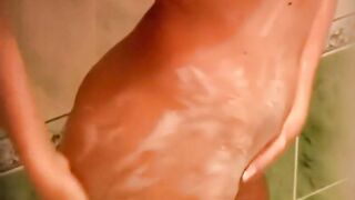watching ow my stepsister soaps her pussy