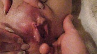 Fingers her butt while she plays with her clitoris!