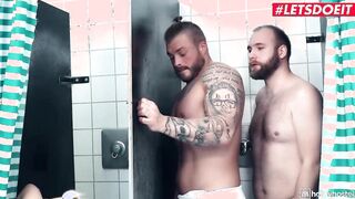 HORNYHOSTEL - GIGANTIC HOOTERS BLONDE TAKES two GUYS INTO THE RESTROOM - LETSDOEIT