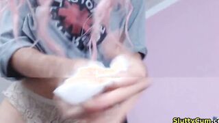Hot Tattooed Babe having fun playing with her Pussy