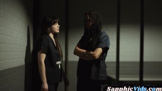 Les prison officer licks and fingers Ebony cunt in office