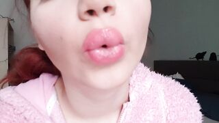 Huge pink lucious lips smoking close up