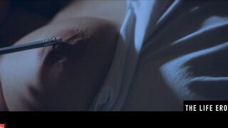Rubbing her long puffy nipples as she fucks herself with a pencil