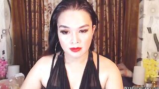 Brunette amateur in black on webcam