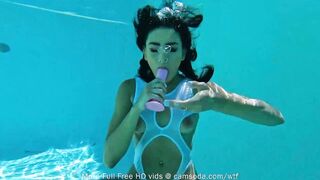 camsoda-Little teen uses dildo during underwater