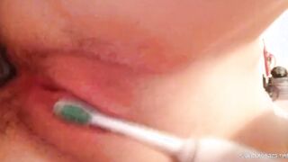 massaging my leaky pussy with a toothbrush