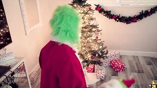 Cindy Lou Who and her adopted sis, Sister Who are sleeping peacefully as the Grinch sneaks into to steal their
