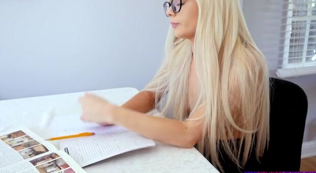 Elsa Jean is studying, but she's not doing very well on her own. She turns