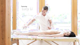 Delectable Lucy Li lays patiently as she waits for her man Matt Ice to oil up his hands and commence