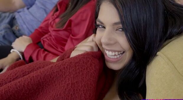 Gina Valentina and her stepbrother Van Wylde are hanging out on the couch with their
