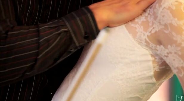 Total Goddess Amarna Miller is dressed to the nines into a tight white dress and high heels, all for the