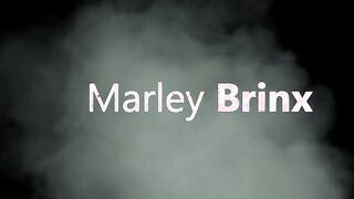Marley Brinx is ready to make a naughty video as she struts her stuff in the dark. Her medium breasts