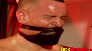 Men with muscles are helpless as they are tied up together