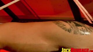 Men with muscles are helpless as they are tied up together