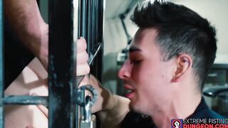 Hardcore fistfucking with two lubed up leather gloves inside