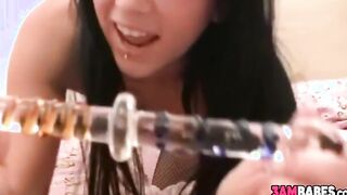 Dark haired Chloe James drills her pussy with big dildo