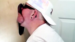 Horny dude with glasses enjoys in a glory hole scene