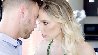 Kenzie Taylor is celebrating St. Patty's Day with a green dress and green beads. The