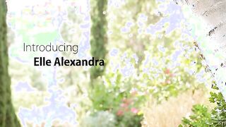 On a warm summer afternoon super redhead Elle Alexandra liking the sunshine. She removes her