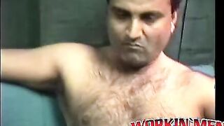 Hairy mature amateur Shawn solo plays with his cock on a bed
