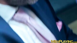 Elegant hunk wears slick blue suit while ramming hot stud