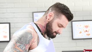 Hot gay threesome inside the tattoo shop