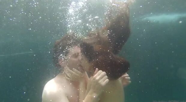 Lucy doll and Preston Parker are enjoying a couple's day inside their private oasis as they swim and frolic into