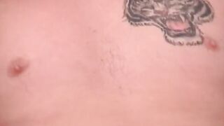 Tattooed amateur dude Mike solo plays in a hotel room