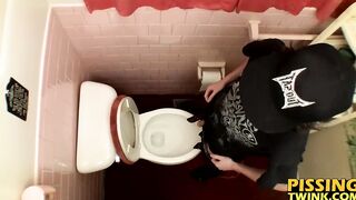 Devin Reynolds grabs his cock and unloads in the toilet|