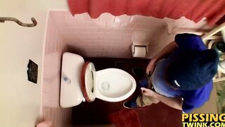 Devin Reynolds grabs his cock and unloads in the toilet|