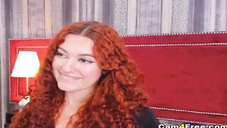 Curly Redhead Shaking While Rubbing Her Pussy