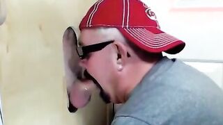 Cock hungry slut sucking delicious cocks in a gloryhole