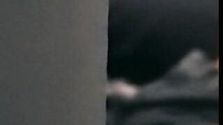 Zack unzips his pants and starts to massage his cock