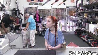 Little redhead temptress earns money by fucking in pawnshop