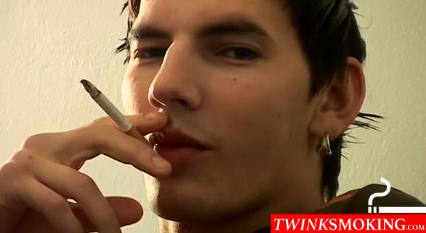 Antony is smoking and stroking his extra big thick dick