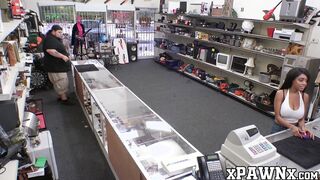 Seductive ebony gal with big hooters fucks a pawnbroker