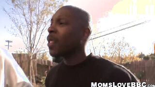 Luscious MILF has a special meeting with two black cocks