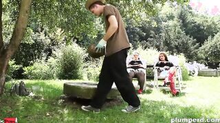 Submissive gardener toyed around by two fatties