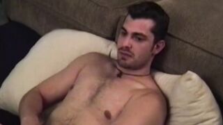 Cute guy enjoys dildoing his rear while jerking off his rod