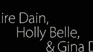 Claire Dain and Holly Belle are spooning in bed when they are joined by the