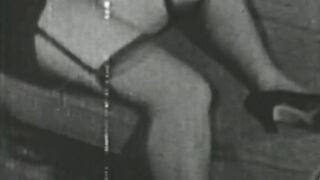Black and white vintage video of lady sucking her lover