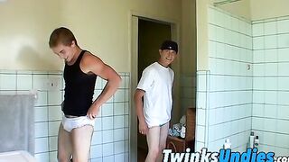 Kelly Cooper and Grant Hiller in a full strip wrestle match
